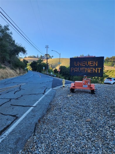 Shannon Road Uneven Pavement Sign