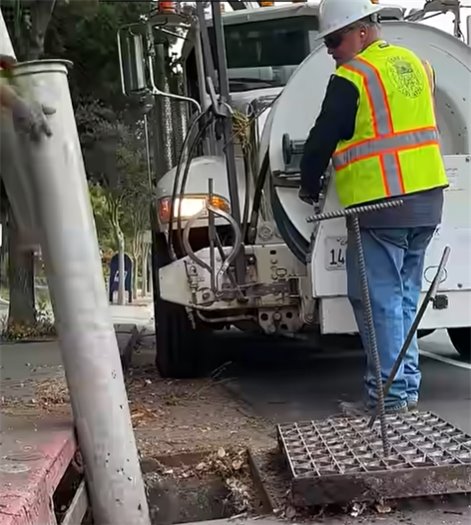 Town of Los Gatos Employee working on storm drain