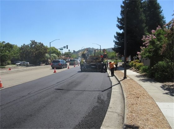 Curb, gutter and sidewalk maintenance being performed